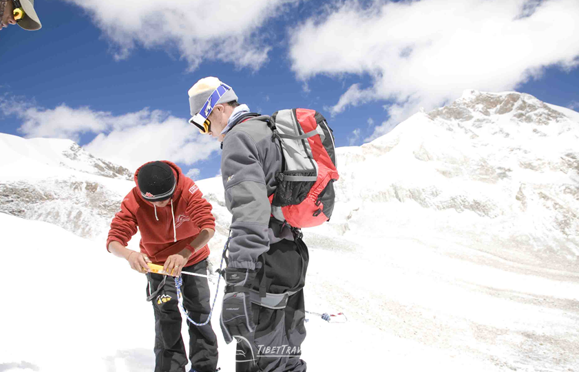 climbing mountain in Tibet