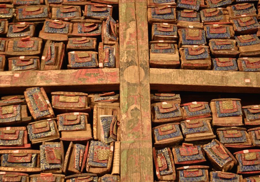 the wall of Buddhist scripture and books in the Sakya Monastery.