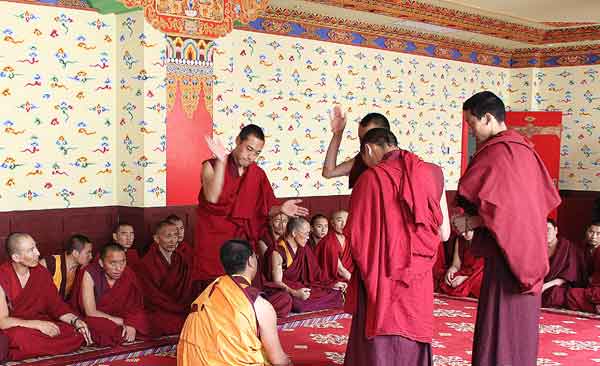 Senior lamas and monks from the Tibetan-inhabited areas of Qinghai Province asked questions to the monk examinee.