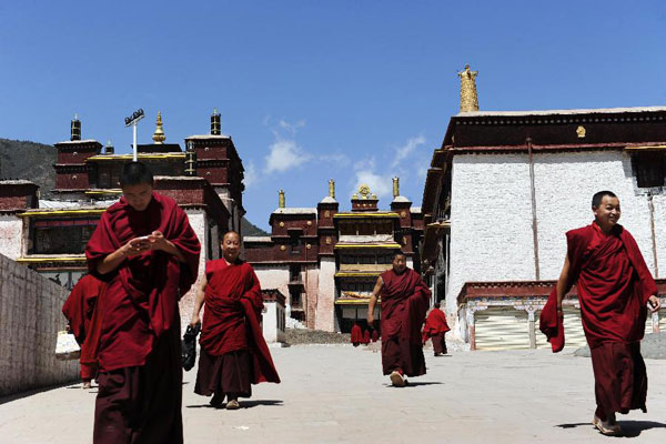 monks walking in the monastery