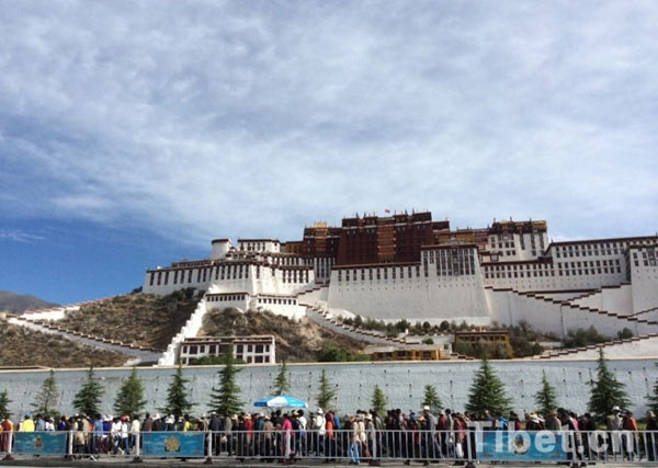  Tibetan Buddhism followers take ritual walk around the Potala Palace in Lhasa