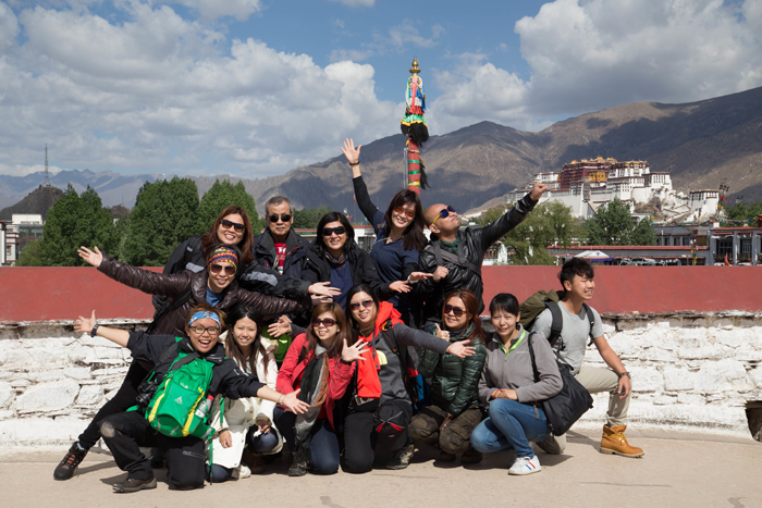 tourists took photo in fron of Jokhang Monastery in Lhasa.