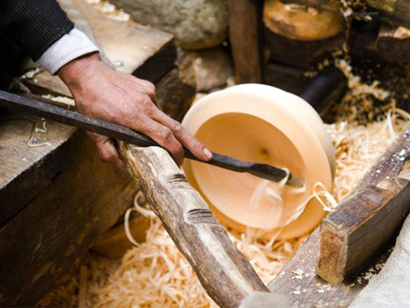 The people use the right wood to make a wooden bowl