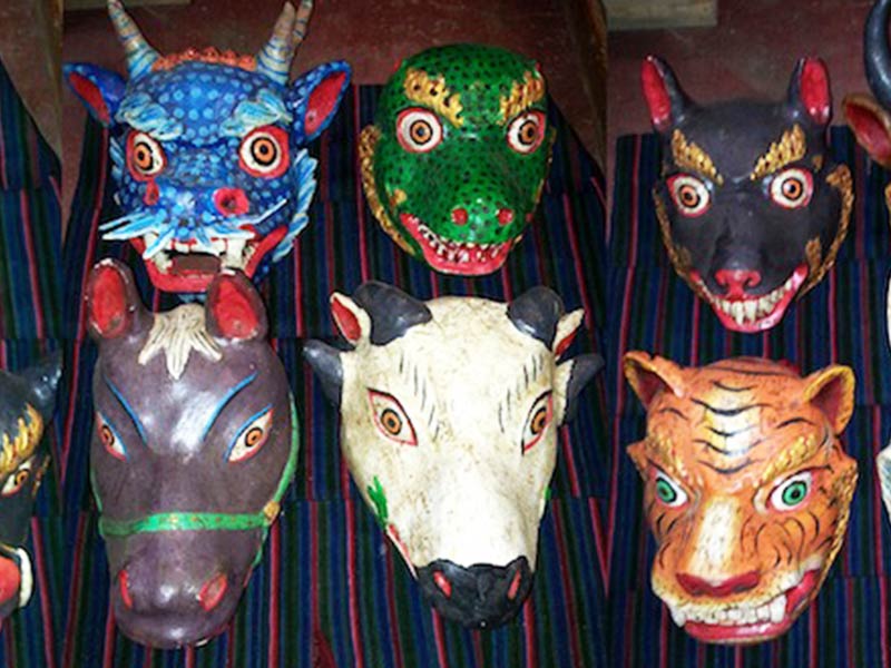 Grand ceremonies featured dances with masks depicting tigers and yaks