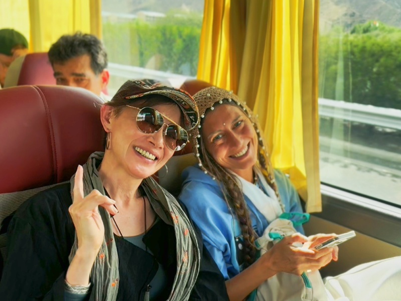 Shared Transportation on Budget Tibet Tours scenic bus ride on a Tibet group tour