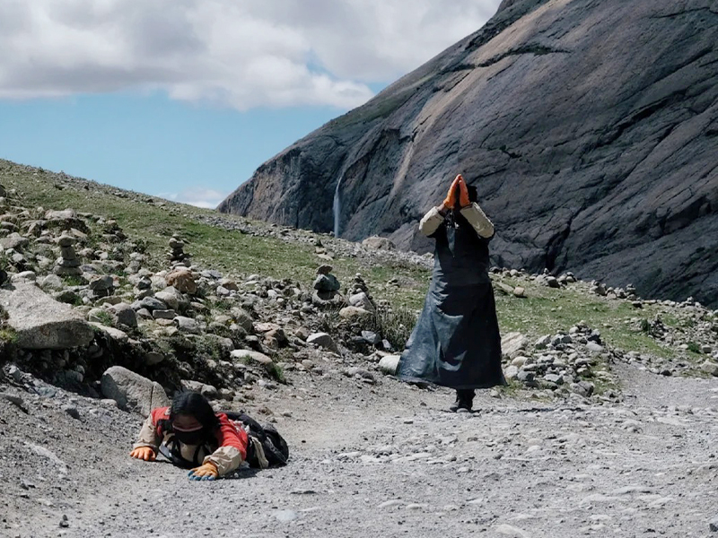 Respect Local Pilgrims During the Mount Kailash Kora Pilgrims performing prostrations along the Mount Kailash Kora