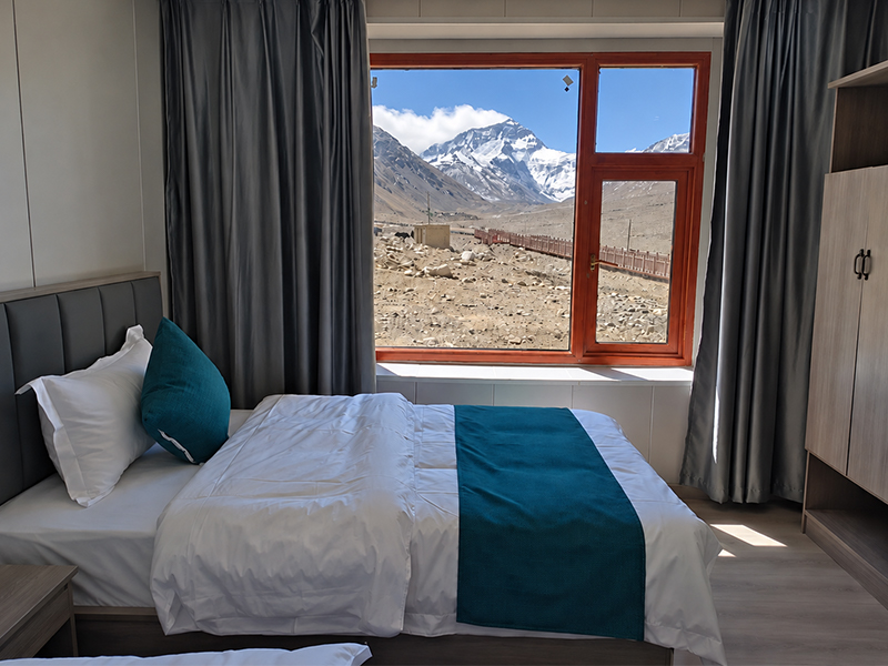 Rongbuk Hotel Accommodation near Everest Base Camp Rongbuk Hotel room with a view of Mount Everest through the window