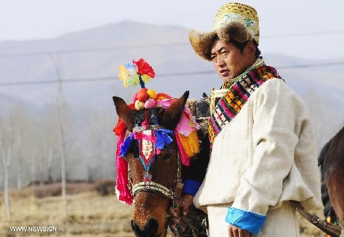 A villager decorates his horse